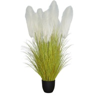 Élégante composition artificielle de blé et d'herbe de roseau dans un petit pot pour chambre douillette, idéale comme cadeau et accent décoratif quotidien pour la maison