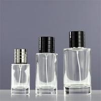 Vente en gros de vaporisateurs de luxe, flacon en verre transparent pour parfum, cylindre vide de 100 ml, emballage en boîte, logo personnalisé