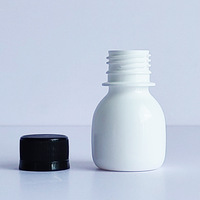 Bouteille de jus de gingembre en plastique PET de 60 ml, forme ronde, prix d'usine, avec bouchon à vis, bouteille de 2 oz pour jus et boissons énergisantes