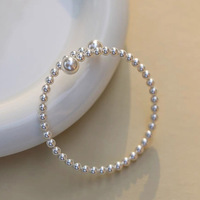 Bracelet en perles de verre, design de niche, accessoire de mode de luxe léger, élégant, extensible, réglable, fausses perles pour femme