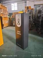 Barrière de contrôle d'accès automatique pour parking avec bras articulé
