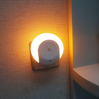 Veilleuse ronde pratique avec capteur CD : chaleur et confort