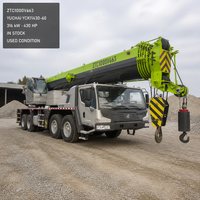 Grue de chantier mobile d'occasion de 100 tonnes ZTC1000V663 en stock, vitesse de 89 km/h, capacité de montée de 49 %, réservoir de carburant de 450 L