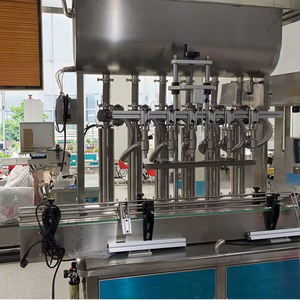 Machine de remplissage automatique de bouteilles en plastique d'huile lubrifiante liquide épaisse de 350ml/100ml avec convoyeur liquide de 5 litres - Product Image 1