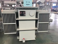 Transformateur de puissance triphasé à faible perte de 1000 kVA 1600 kVA avec coussin d'huile certifié CE pour système d'énergie éolienne/solaire de 400 V à 35 kV