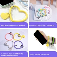 Vente en gros de porte-clés en silicone en forme de cœur, bracelet de poignet, sangle de téléphone anti-chute, anti-perte, unisexe, logo personnalisé