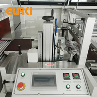 Machine d'emballage sous film rétractable GURKI à scellage continu - Automatique, électrique, haute température, pour aliments, boissons, produits chimiques, textiles