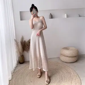 Summer new suspender dress female thin ice silk A word with long skirt lace sexy goddess knitted skirt.