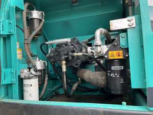 รถขุดขนาดเล็ก Kobelco SK210LC มือสอง น้ำหนักใช้งาน 22 ตัน พร้อมเครื่องยนต์ Cummins เกียร์ Kawasaki ปั๊ม และลูกปืน - Product Image 6