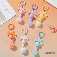 Nouveau porte-clés coloré en plastique avec pompon et perles de puzzle, fait main, breloque de téléphone, nœud papillon DIY, boîte surprise, pendentif mignon