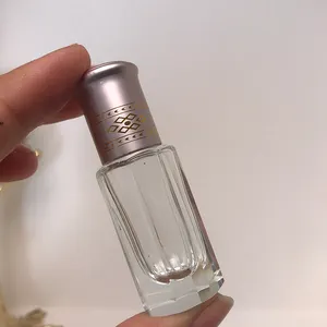 Bouteille de oud atomiseur rechargeable de parfum en aluminium unique en verre Attar UV personnalisé