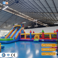 Aire de jeux gonflable géante commerciale avec toboggan et château gonflable pour la location d'événements d'été en plein air