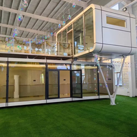 Structure de conteneur mobile capsule au design moderne et populaire, 40 pieds, maisonnette préfabriquée, maisonnette Apple, villa pour bureau