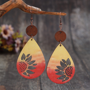 Pendientes colgantes vintage con forma de gota de girasol para mujer, joyería hueca de doble cara estilo madera - Product Image 1