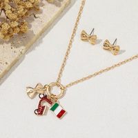 Ensemble de bijoux italiens tendance plaqué or avec boucles d'oreilles papillon et collier pendentif pour femme, idéal pour la vente en gros et la personnalisation