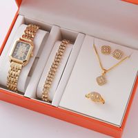 Nouvelle montre pour femme en métal de luxe léger, montre à quartz carrée simple et tendance pour étudiante, vente en gros