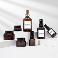 Flacon pompe en verre cosmétique de qualité supérieure avec mécanisme de pulvérisation fine pour l'emballage de beurre corporel et de crème pour le visage