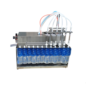 Machine de remplissage de liquides à haute viscosité à 6 têtes pour crème, pâte et miel en stick, avec réservoir de chauffage - Product Image 1