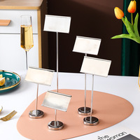 Porte-cartes de menu de restaurant en gros Carte de nom de bureau de fête de mariage Support de carte de fil d'or Petit porte-numéro de table en métal
