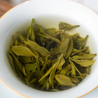 Nouvelle récolte biologique Hangzhou Long Jing Dragon bien thé vert Xihu Longjing feuille emballée dans une boîte en sac et en vrac