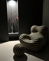 Fauteuil pouf inclinable de style moderne avec housse amovible, revêtement en tissu imperméable, confort élevé, canapé paresseux avec repose-pieds