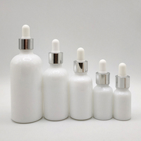 Bouteille de sérum cylindrique vide personnalisée de 100ml 20ml 15ml 30ml 50ml Bouteille d'huile en verre blanc Flacon compte-gouttes d'huile essentielle pour cheveux