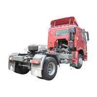 Truk Traktor Sinotruk HOWO 4X2 Kabin Atap Tinggi Merah Tugas Berat Penarik Utama Semi Trailer Head WD615.47 351-450HP Euro 2
