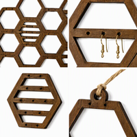 Support mural hexagonal en bois alvéolé pour boucles d'oreilles, organisateur de bijoux découpé au laser, vente en gros OEM, présentoir de rangement pour bijoux