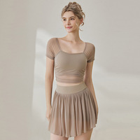Ensemble de yoga 2 pièces pour femme, couleur unie, respirant, en maille, pour l'été, avec jupe plissée anti-exposition pour le fitness et le tennis
