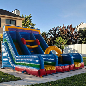 Structure gonflable commerciale double piste avec toboggan, mur d'escalade, château gonflable et parcours d'obstacles pour enfants et adultes, idéale pour la location événementielle - Product Image 3