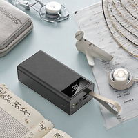 2024 Hot Gran capacidad 50000MAH USB TIPO C Banco de energía portátil con cable de salida de 10W Banco de carga y función de linterna