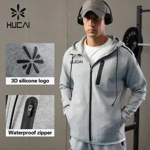 HUCAI изготовитель на заказ воздушный хлопок силиконовый принт логотип флисовая невидимая толстовка на молнии тренировочная спортивная куртка для мужчин