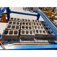 Machine de fabrication de blocs de béton entièrement automatique pour la collecte de briques anciennes et le séparateur de palettes de blocs