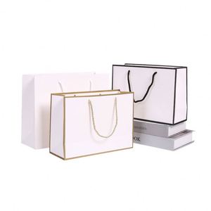 ถุงกระดาษหูหิ้วสำหรับรองเท้าและเสื้อผ้า ถุงช้อปปิ้งแบบคราฟท์ - Product Image 4