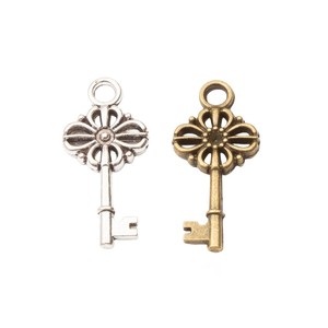 Pendentif clé squelette nœud floral en alliage <span class=keywords><strong>de</strong></span> zinc argent antique filigrané pour décoration <span class=keywords><strong>de</strong></span> mariage steampunk - Product Image 1