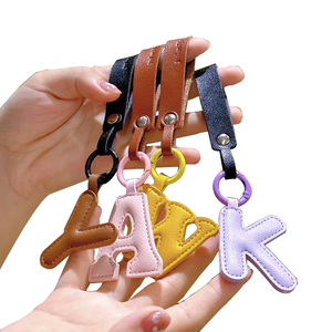 Wholesale Fashion PU Leather Letter Pendant Keychain Charm Bag Promotional Custom Luxury Leather Keychain