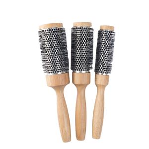 Spazzole per capelli in ceramica per donna con logo spazzola per capelli da salone su pettine per capelli ricci di grandi dimensioni spazzola per massaggio spazzola per capelli rotonda in legno - Product Image 1