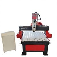 Machine de gravure CNC (avec axe rotatif) pour la gravure 3D sur bois de objets artisanaux et de statues.