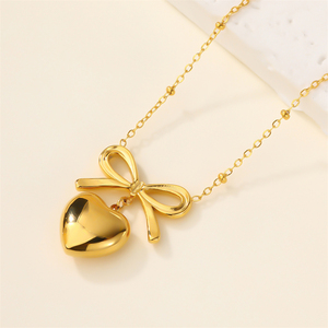 Magnifique collier avec pendentif cœur plaqué or 18 carats PVD, perles en acier inoxydable ultra-fines, chaîne à maillons, nœud d'amour, collier cœur. - Product Image 1