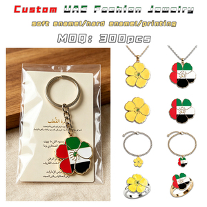 Llaveros y dijes de flor nacional emiratí personalizados al por mayor de <span class=keywords><strong>Tribulus</strong></span> Omanense de los EAU, con diseño de jazmín amarillo, directo de fábrica antigua - Product Image 1