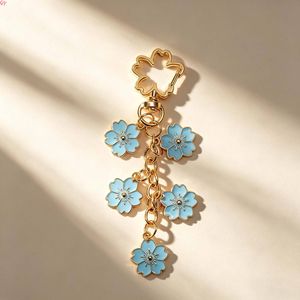 QQ New Enamel Flower <b>Keychain</b> Pendant Cherry Blossom <b>Keychain</b> High-end Design Key Ring Wholesale in Stock - Product Image 6