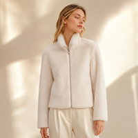Veste courte de luxe pour femme en fausse fourrure de vison, col montant droit, dos matelassé avec empiècements en similicuir, coupe ample, pour l'hiver