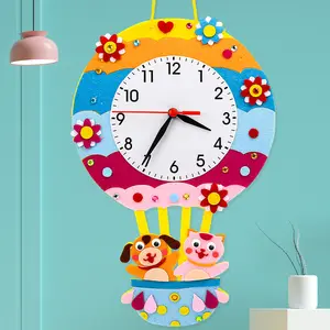 Venta al por mayor DIY rompecabezas aprendizaje reloj niños fieltro reloj artesanía tela no tejida juguetes educativos DIY suministro
