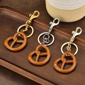 Creative Biscuit Metal Keychain High Quality Hot Selling Pendants Car Metal Keychain Women <b>Bag</b> Charms Wholesale - Product Image 3