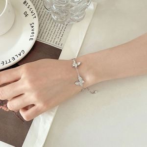 Dylam Dainty Design Fine Fashion Jewelry 925 Silver Crushed Ice Butterfly Butterfly Silhouette Glistened 5A CZ Mini Bracelet - Product Image 3