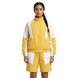 Ensemble de survêtement sportif 2 pièces pour femme, jaune et blanc, à blocs de couleur, avec short et haut à manches longues à col montant, en polyester respirant, Printemps-Été - Product Image 1