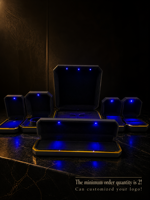 Boîte à bijoux LED noire octogonale à bord doré en gros, boîte à bijoux LED noire pour la vente au détail, boîte à bijoux LED noire octogonale à bord doré en stock