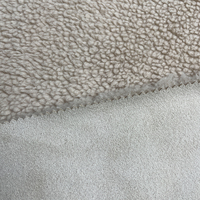 Tissu en fausse fourrure de peau de mouton Tissu en fausse fourrure collée en daim pour vêtements d'hiver Veste Manteau