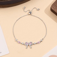 Bracelet pour femme en zircon rose avec nœud papillon, unique, éthéré, frais, doux, luxueux, raffiné, chic, cadeau, accessoire de mode