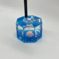 Presse-papiers multifonctionnel en forme d'hexagone, papeterie liquide colorée avec flotteurs mignons, porte-stylo décoratif fantaisie en forme de dauphin